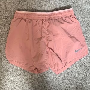 Nike Womens light pink running shorts